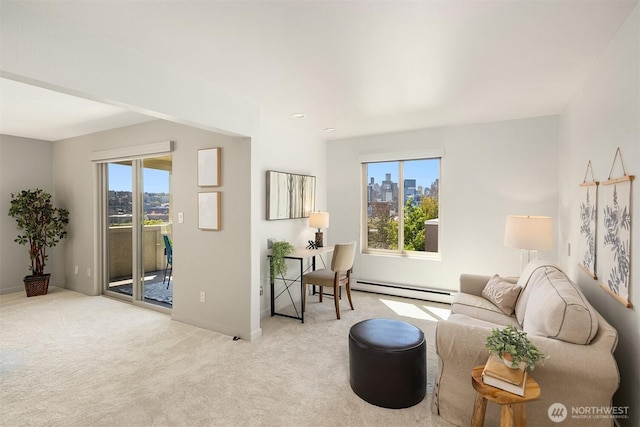 1234 Taylor Ave N Unit 401, Seattle, WA 98109 - living area featuring a baseboard radiator, carpet, and plenty of natural light