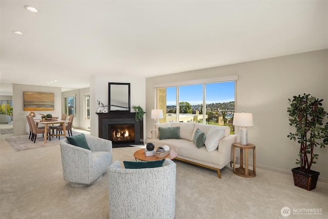 1234 Taylor Ave N Unit 401, Seattle, WA 98109 - living room with carpet flooring, a fireplace with flush hearth, and recessed lighting