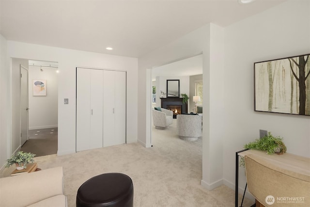 1234 Taylor Ave N Unit 401, Seattle, WA 98109 - interior space featuring carpet, a lit fireplace, and recessed lighting