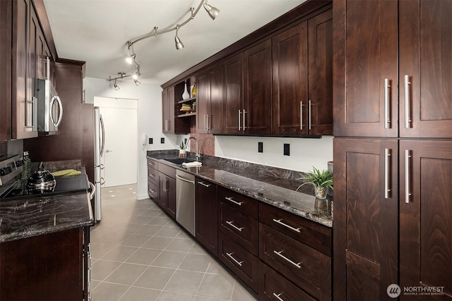 1234 Taylor Ave N Unit 401, Seattle, WA 98109 - kitchen with appliances with stainless steel finishes, dark stone countertops, dark brown cabinets, and open shelves