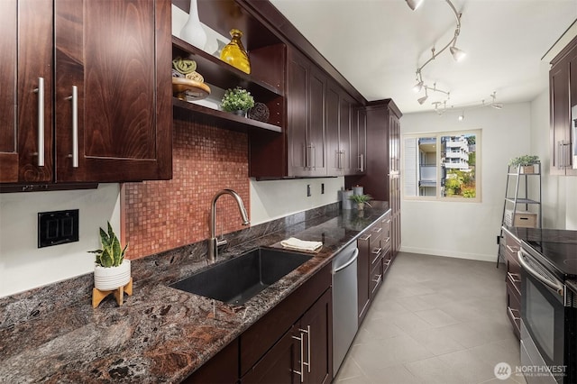 1234 Taylor Ave N Unit 401, Seattle, WA 98109 - kitchen with appliances with stainless steel finishes, dark stone countertops, dark brown cabinetry, and open shelves