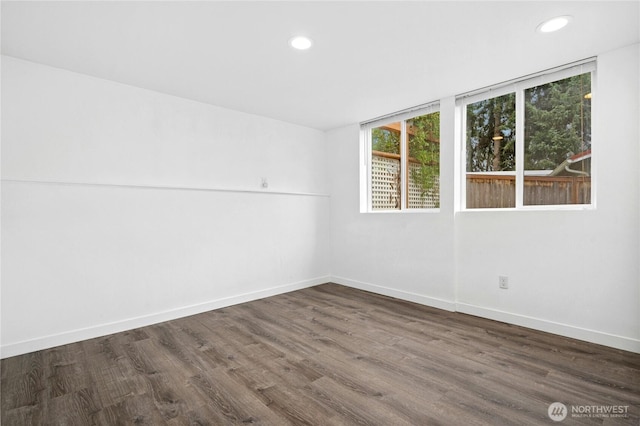 16654 SE 26th Pl, Bellevue, WA 98008 - spare room with dark wood-style flooring and recessed lighting
