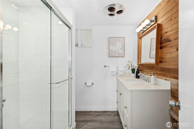 16654 SE 26th Pl, Bellevue, WA 98008 - bathroom with vanity, a shower stall, and wood finished floors