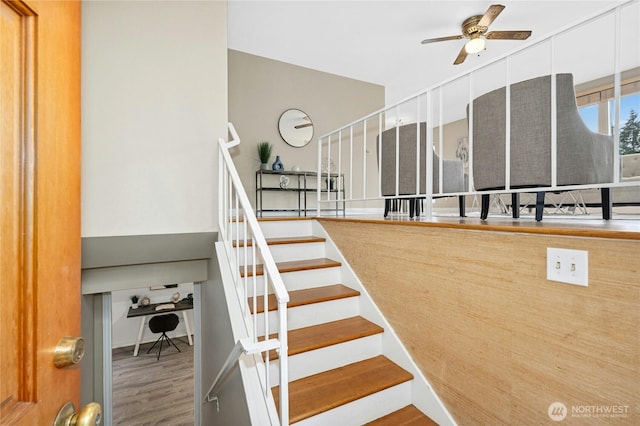 16654 SE 26th Pl, Bellevue, WA 98008 - stairway featuring ceiling fan and wood finished floors