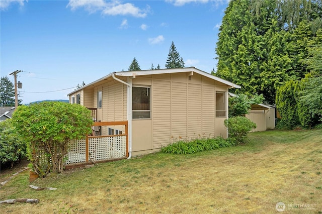 16654 SE 26th Pl, Bellevue, WA 98008 - view of side of home featuring a lawn