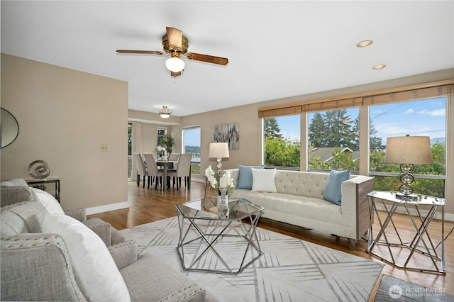 16654 SE 26th Pl, Bellevue, WA 98008 - living area featuring a ceiling fan, wood finished floors, and recessed lighting