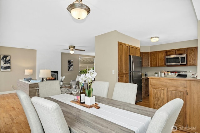 16654 SE 26th Pl, Bellevue, WA 98008 - dining space with a ceiling fan and light wood finished floors