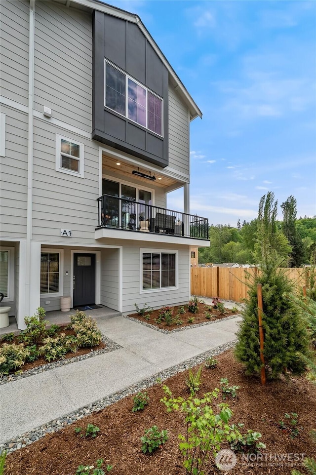 1322 194th St SE Unit G6, Bothell, WA 98012 - rear view of property featuring a balcony