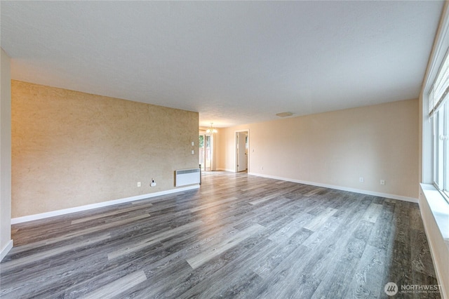 60 Crystal Ct, Sequim, WA 98382 - unfurnished room featuring a chandelier and wood finished floors