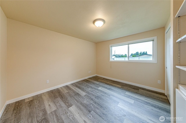 60 Crystal Ct, Sequim, WA 98382 - unfurnished bedroom featuring wood finished floors and baseboards