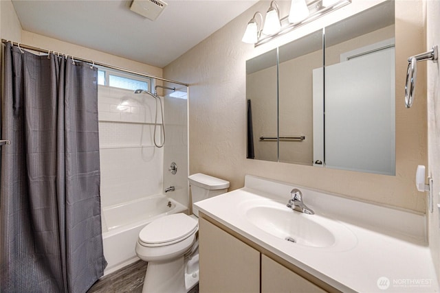 60 Crystal Ct, Sequim, WA 98382 - bathroom with shower / bath combo, vanity, a textured wall, and wood finished floors