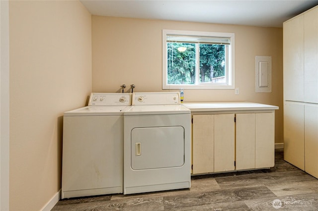 60 Crystal Ct, Sequim, WA 98382 - washroom with cabinet space, washer and dryer, wood finished floors, and electric panel