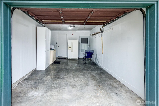 60 Crystal Ct, Sequim, WA 98382 - garage with white refrigerator with ice dispenser