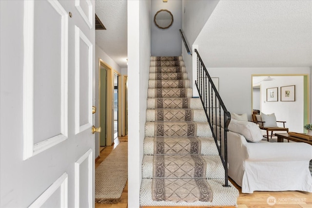 527 N 155th St, Shoreline, WA 98133 - stairs with wood finished floors and a textured ceiling