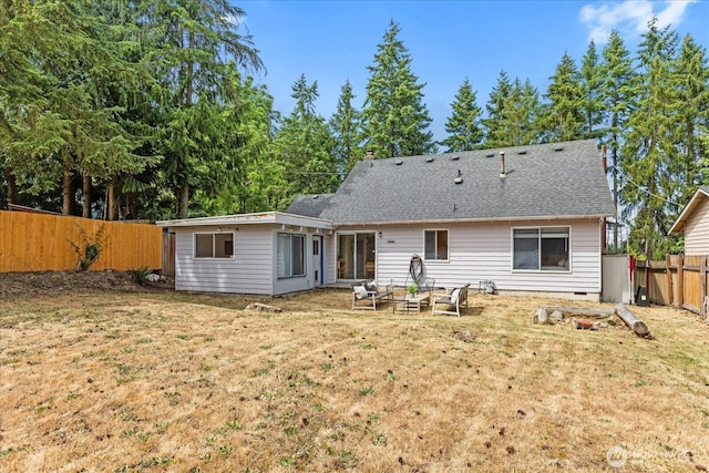 527 N 155th St, Shoreline, WA 98133 - back of house featuring a fenced backyard and a shingled roof