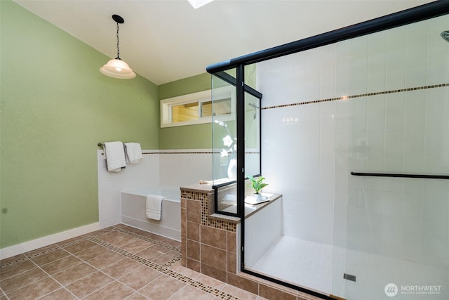 2327 31st Ave NW, Olympia, WA 98502 - full bath featuring a garden tub, a shower stall, vaulted ceiling, and tile patterned floors