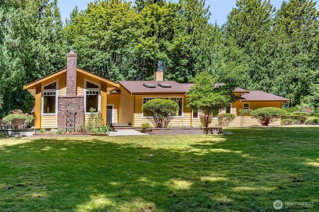 2327 31st Ave NW, Olympia, WA 98502 - view of front of home with a chimney and a front yard