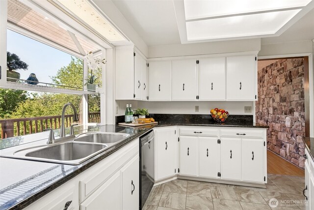 5415 Johnson Point Rd NE, Olympia, WA 98516 - kitchen with dishwasher and white cabinetry