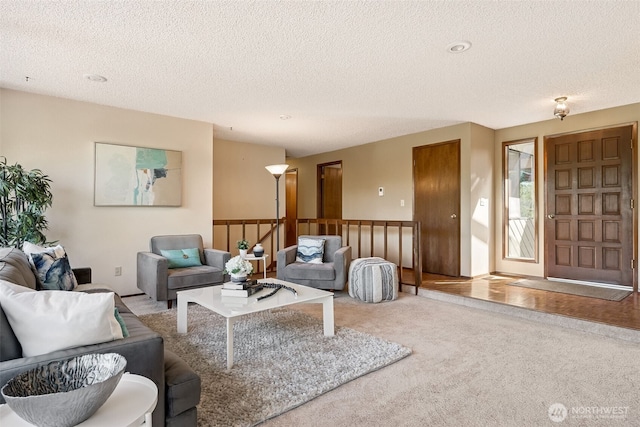 5415 Johnson Point Rd NE, Olympia, WA 98516 - living area with carpet and a textured ceiling