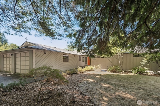 5415 Johnson Point Rd NE, Olympia, WA 98516 - view of yard featuring a garage