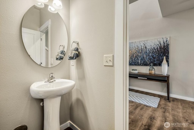 28003 74th Ave NW Unit 33, Stanwood, WA 98292 - bathroom featuring wood finished floors and baseboards