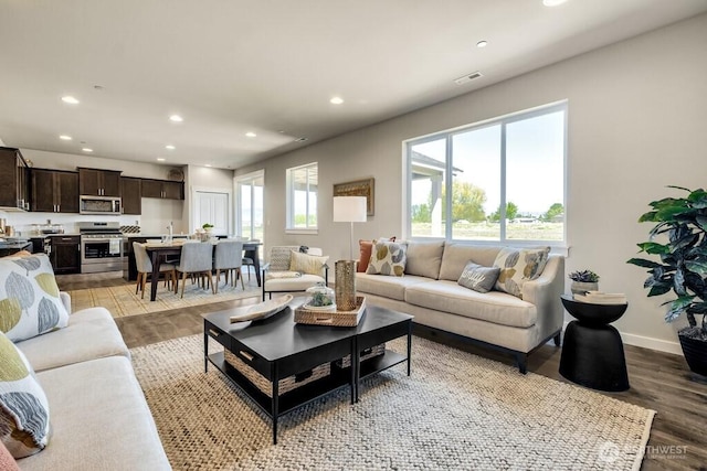 28003 74th Ave NW Unit 33, Stanwood, WA 98292 - living room with light wood-type flooring and recessed lighting
