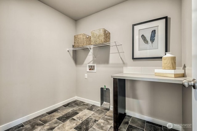 28003 74th Ave NW Unit 33, Stanwood, WA 98292 - laundry area featuring hookup for a washing machine and baseboards