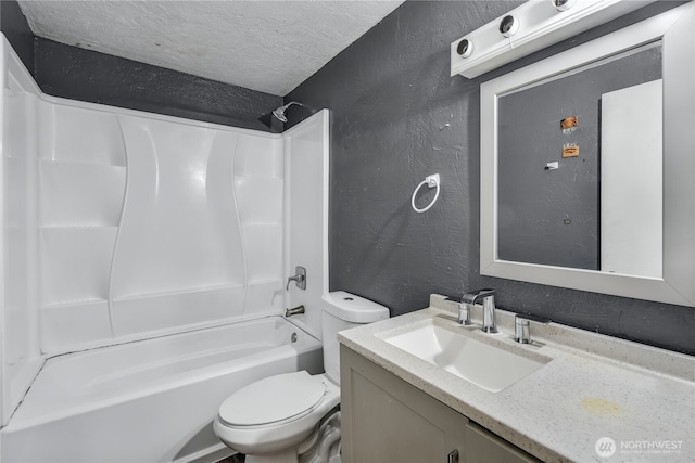 11846 SE 170th Pl, Renton, WA 98258 - bathroom featuring a textured wall, vanity, bathtub / shower combination, and a textured ceiling