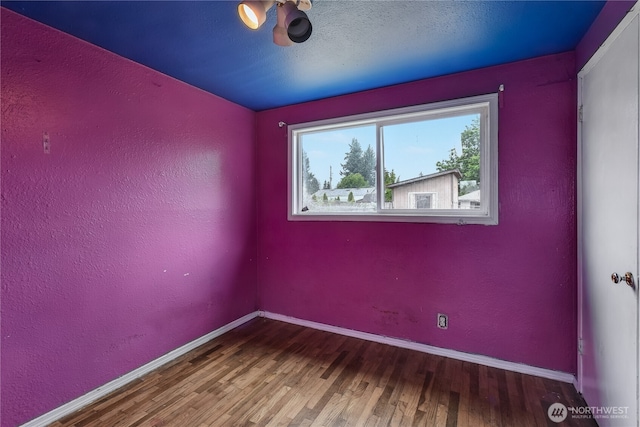 11846 SE 170th Pl, Renton, WA 98258 - spare room with wood finished floors