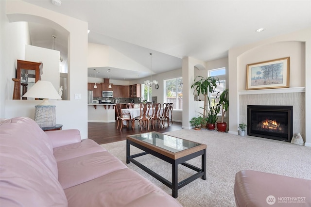9647 6th Way SE, Lacey, WA 98513 - living room featuring vaulted ceiling, a tile fireplace, recessed lighting, and a chandelier