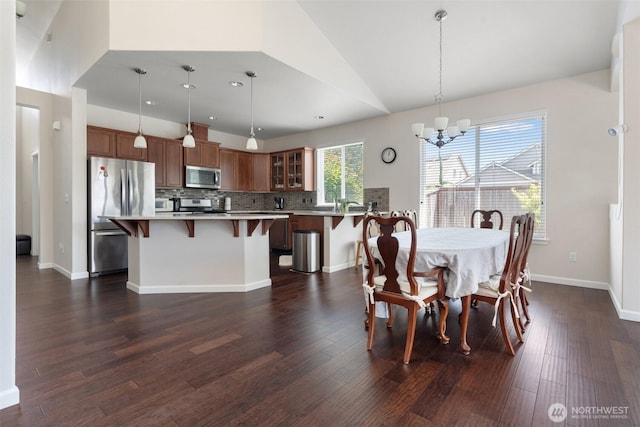 9647 6th Way SE, Lacey, WA 98513 - dining area featuring a chandelier, lofted ceiling, dark wood-style flooring, and recessed lighting