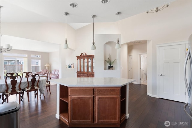 9647 6th Way SE, Lacey, WA 98513 - kitchen with high vaulted ceiling, open shelves, dark wood-style floors, pendant lighting, and a chandelier