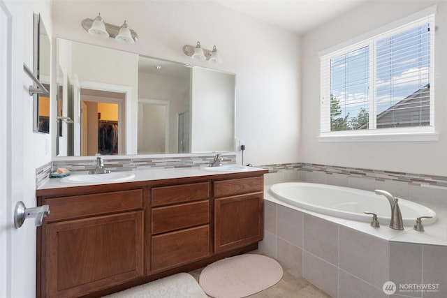 9647 6th Way SE, Lacey, WA 98513 - full bath featuring a bath, double vanity, and a walk in closet