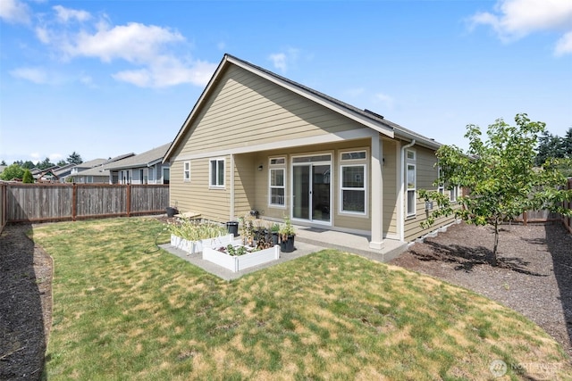 9647 6th Way SE, Lacey, WA 98513 - back of house featuring a garden and a fenced backyard