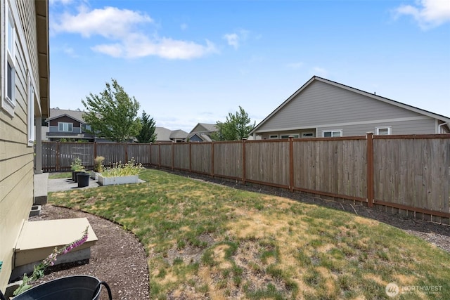 9647 6th Way SE, Lacey, WA 98513 - fenced backyard featuring a vegetable garden