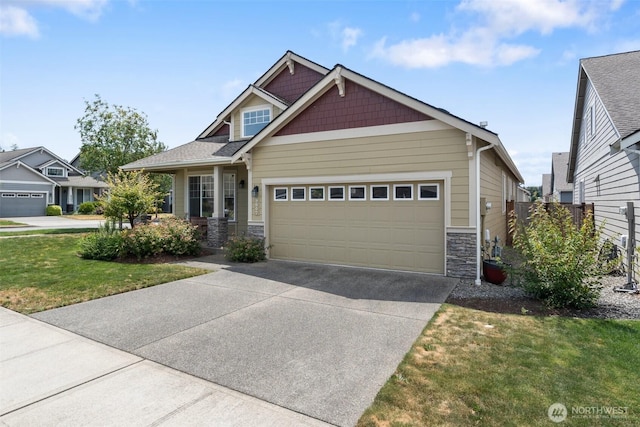 9647 6th Way SE, Lacey, WA 98513 - craftsman house featuring stone siding, concrete driveway, an attached garage, and a front yard
