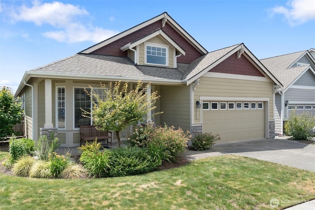 9647 6th Way SE, Lacey, WA 98513 - craftsman house featuring driveway, an attached garage, a shingled roof, and a front yard