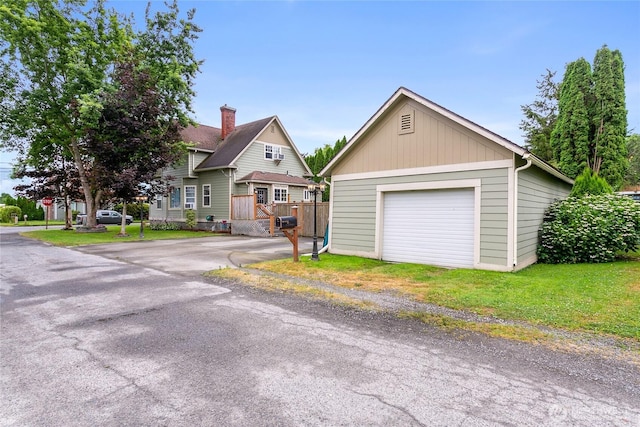 302 S Washington, Everson, WA 98247 - view of front of home with an outbuilding, a detached garage, and driveway