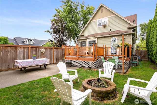 302 S Washington, Everson, WA 98247 - rear view of property with an outdoor fire pit, a fenced backyard, a patio, and a wooden deck