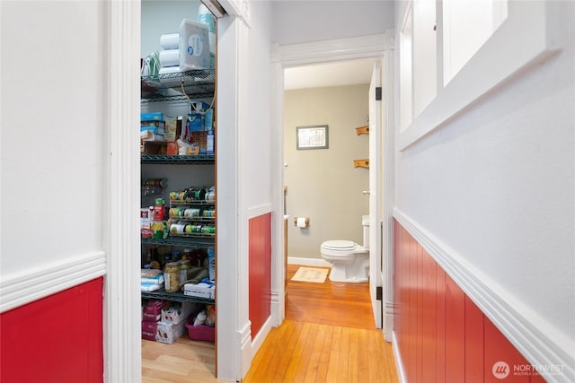 302 S Washington, Everson, WA 98247 - hallway featuring light wood-style floors and a wainscoted wall