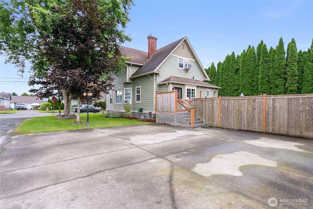 302 S Washington, Everson, WA 98247 - view of front facade featuring a chimney and a shingled roof