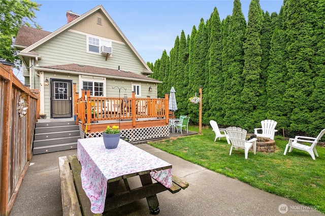 302 S Washington, Everson, WA 98247 - back of house featuring a fire pit, a yard, a wooden deck, a patio, and outdoor dining space