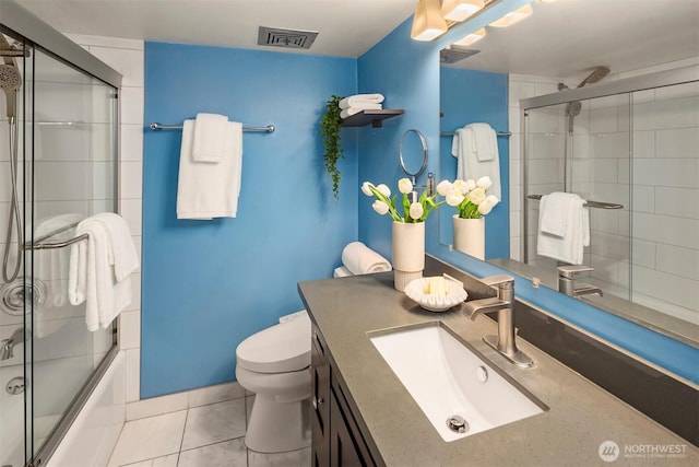 505 Belmont Ave E Unit 801, Seattle, WA 98102 - bathroom with vanity, shower / bath combination with glass door, and tile patterned flooring