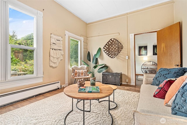 1814 Wilson Ave, Bellingham, WA 98225 - living room featuring a baseboard radiator and wood finished floors