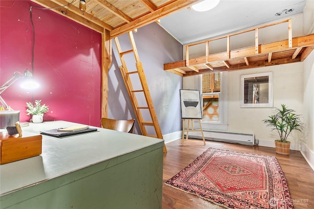 1814 Wilson Ave, Bellingham, WA 98225 - laundry area with baseboard heating, wood finished floors, and an office area