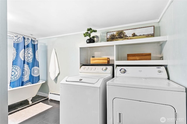 1814 Wilson Ave, Bellingham, WA 98225 - laundry area featuring washing machine and dryer, baseboard heating, crown molding, and tile patterned floors