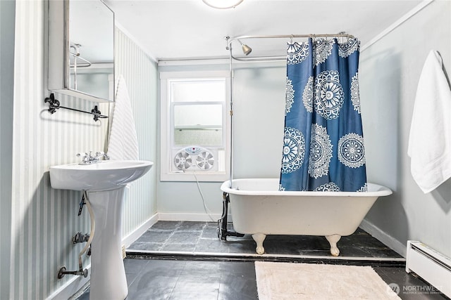 1814 Wilson Ave, Bellingham, WA 98225 - bathroom with a baseboard heating unit, a freestanding bath, and a shower with shower curtain