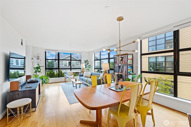 4116 California Ave SW Unit 309, Seattle, WA 98116 - dining room with light wood-type flooring