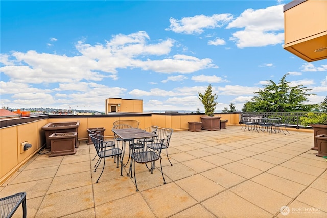 4116 California Ave SW Unit 309, Seattle, WA 98116 - view of patio featuring outdoor dining area