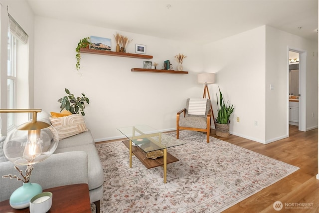 2101 N 55th St Unit 312, Seattle, WA 98103 - living area with wood finished floors and baseboards